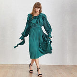 Pleated ruffled midi dress in wave green