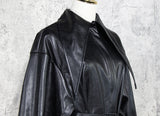 Belted jacket with mesh hem